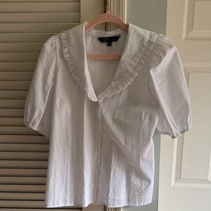 Elegant White Ruffled Blouse